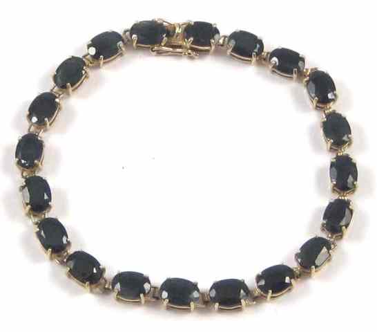 Appraisal: SAPPHIRE AND TEN KARAT GOLD BRACELET '' in length the