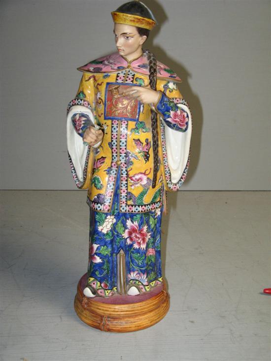 Appraisal: French porcelain figure of Japanese man in ceremonial dress holding