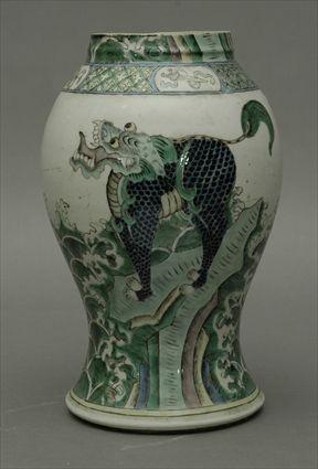 Appraisal: Chinese Famille Verte Porcelain Vase with Fu Dogs and Waves