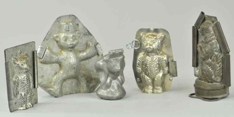 Appraisal: FIVE TEDDY BEAR CHOCOLATE MOLDS All metal various ages unusual