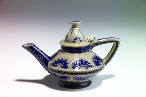 Appraisal: MARTIN BROTHERS Aesthetic Movement salt-glazed stoneware teapot incised with stylized