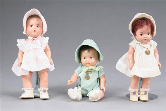 Appraisal: THREE QUINT BABIES All jointed Two with molded hair one