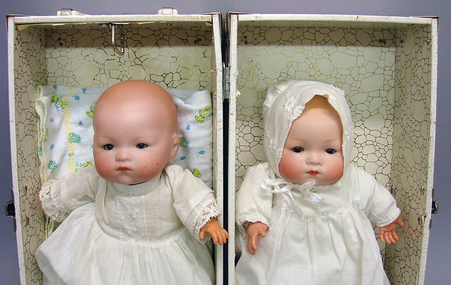 Appraisal: Pair of twin babies Both are L and have cir