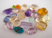 Appraisal: A quantity of loose polished gemstones including citrine amethyst peridot