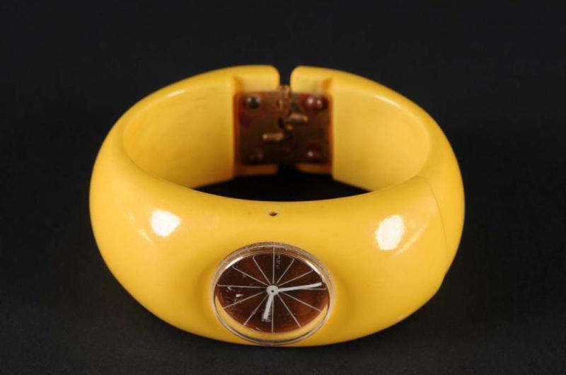 Appraisal: Bakelite Yellow Hinged Cuff Watch Condition Excellent Size W