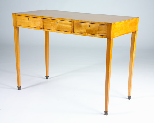 Appraisal: JEAN-MICHEL FRANK COMTE LTDA Three-drawer desk of light wood with