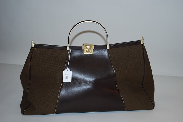 Appraisal: Barry Kieselstein-Cord brown leather cloth tote with signature accents and