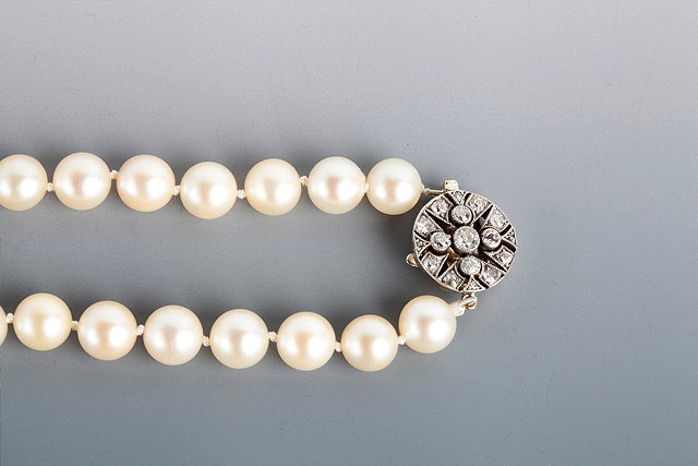 Appraisal: A CULTURED PEARL NECKLACE mm pearls cm long with diamond