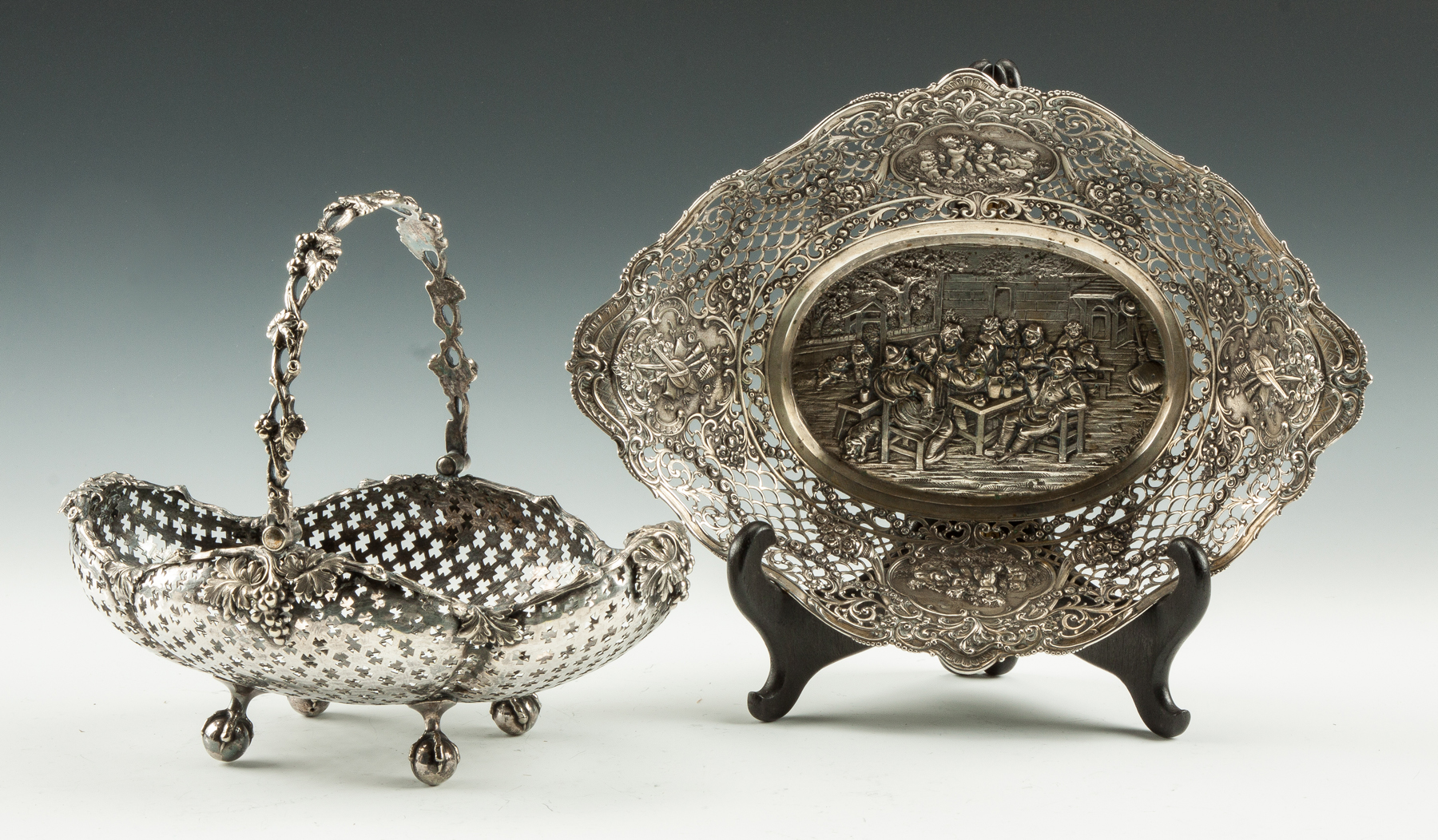 Appraisal: Two Continental Silver Baskets Reticulated basket with grape leaf border