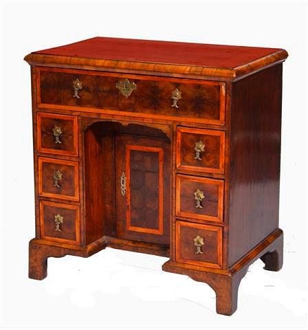 Appraisal: A QUEEN ANNE WALNUT AND OYSTER LABURNUM KNEEHOLE DESK with