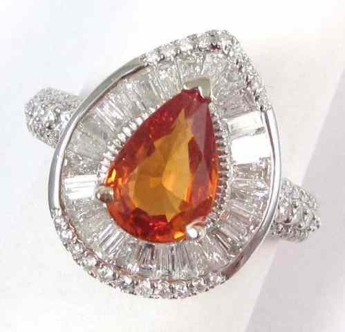 Appraisal: ORANGE SAPPHIRE AND DIAMOND RING k white gold with tapered