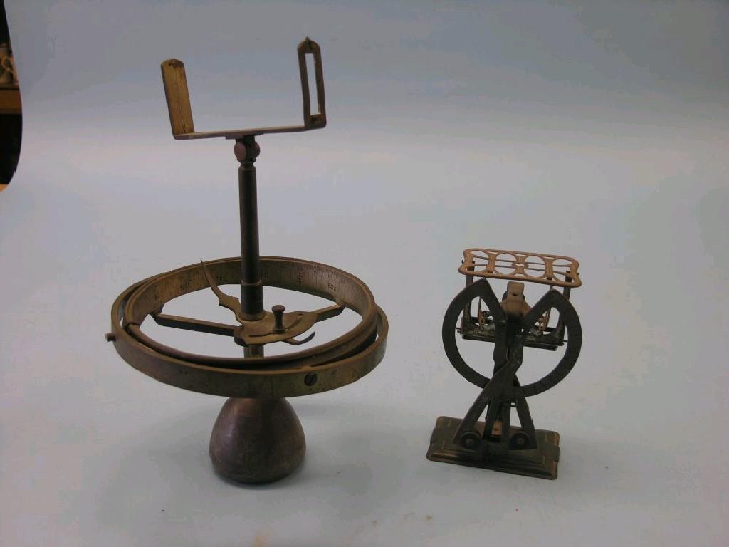 Appraisal: A Morton's Patent nautical navigational instrument brass construction with gimble