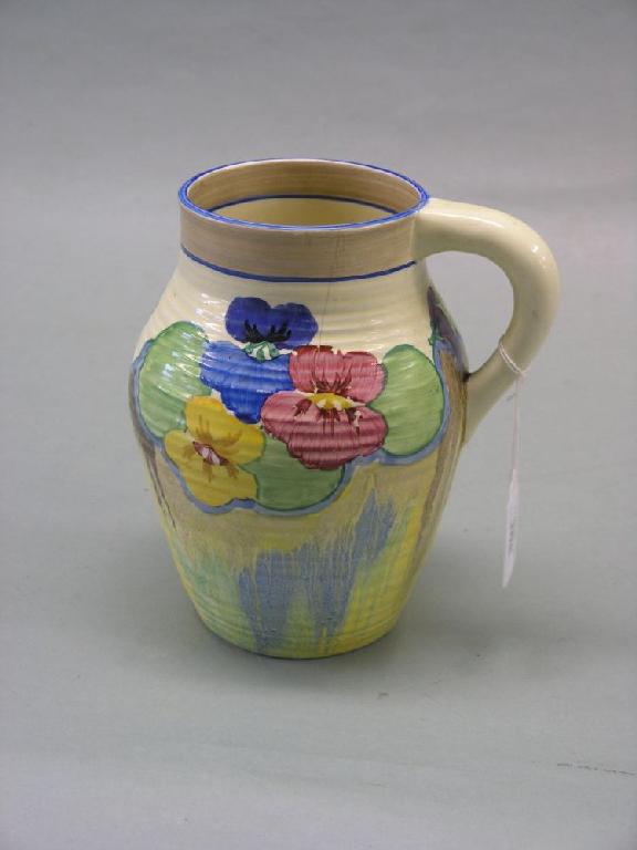 Appraisal: A Clarice Cliff Lotus jug 'Pansies' shoulder design of pansies