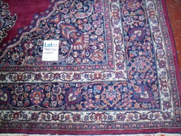 Appraisal: A Tabriz type carpet the madder field with a central