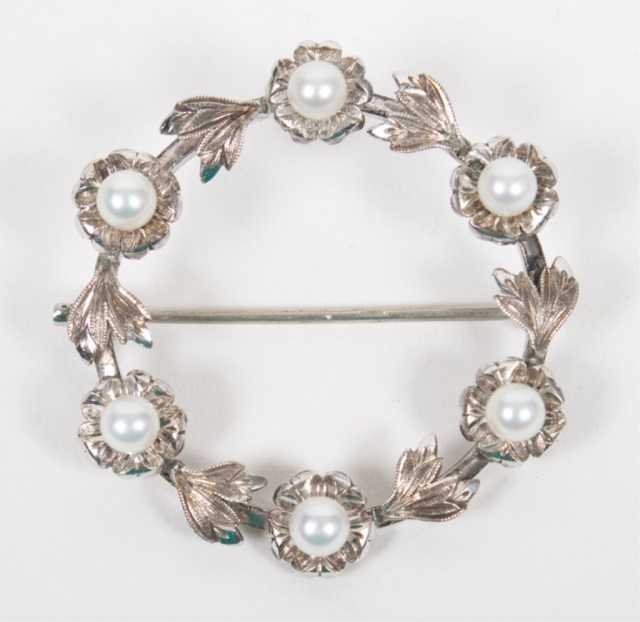 Appraisal: Mikimoto silver and pearl brooch modelled as a floral wreath