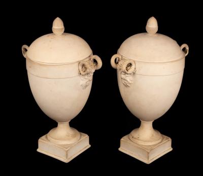 Appraisal: A pair of Wedgwood white jasper Neoclassical vases and covers