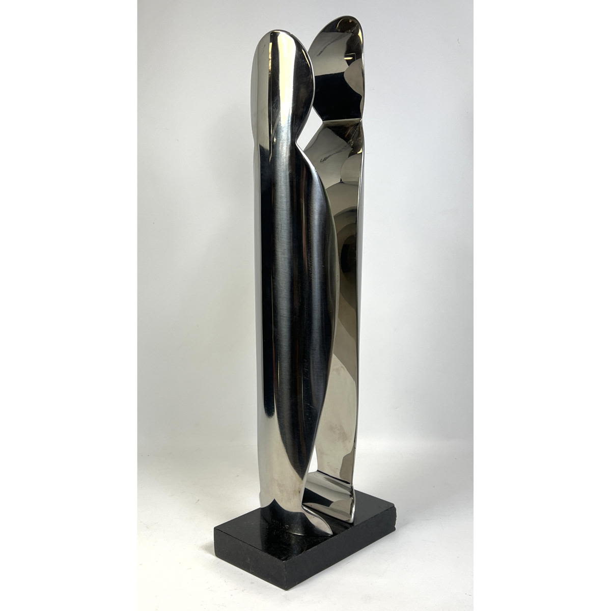 Appraisal: VAINO LATTI Chrome Modernist Sculpture FINLAND Two standing figures on