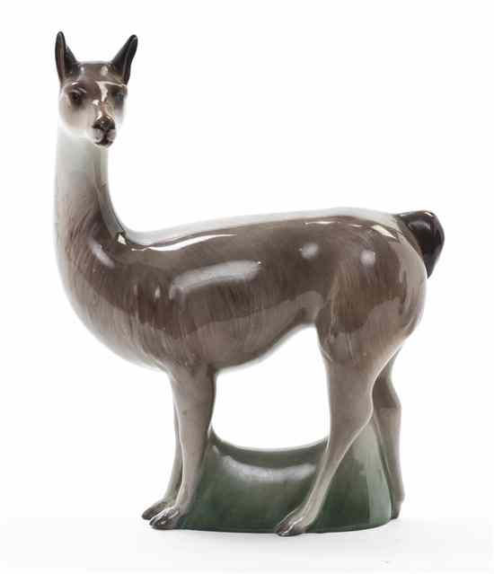 Appraisal: A Royal Doulton Animal Figure depicting a standing alpaca Height