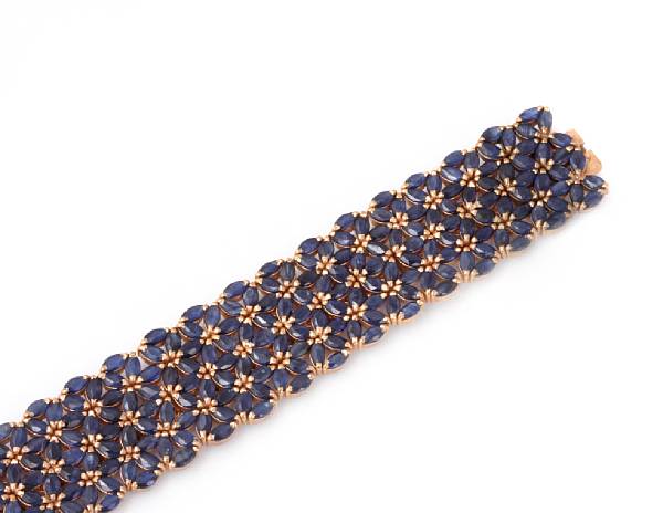 Appraisal: A sapphire and k gold wide flexible bracelet length in