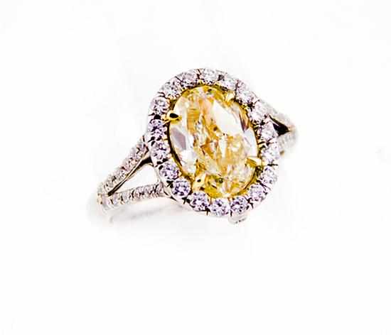 Appraisal: Fancy yellow diamond ring platinum and K white gold set