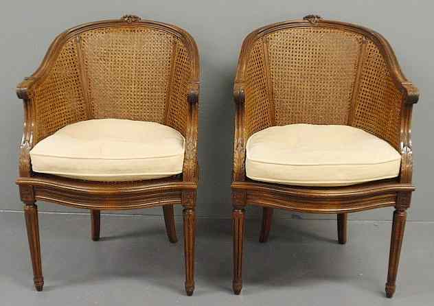 Appraisal: Pair of French cane-back berg res with fluted round legs