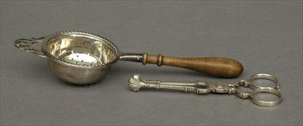 Appraisal: English Silver Tea Strainer and Sugar Nips in