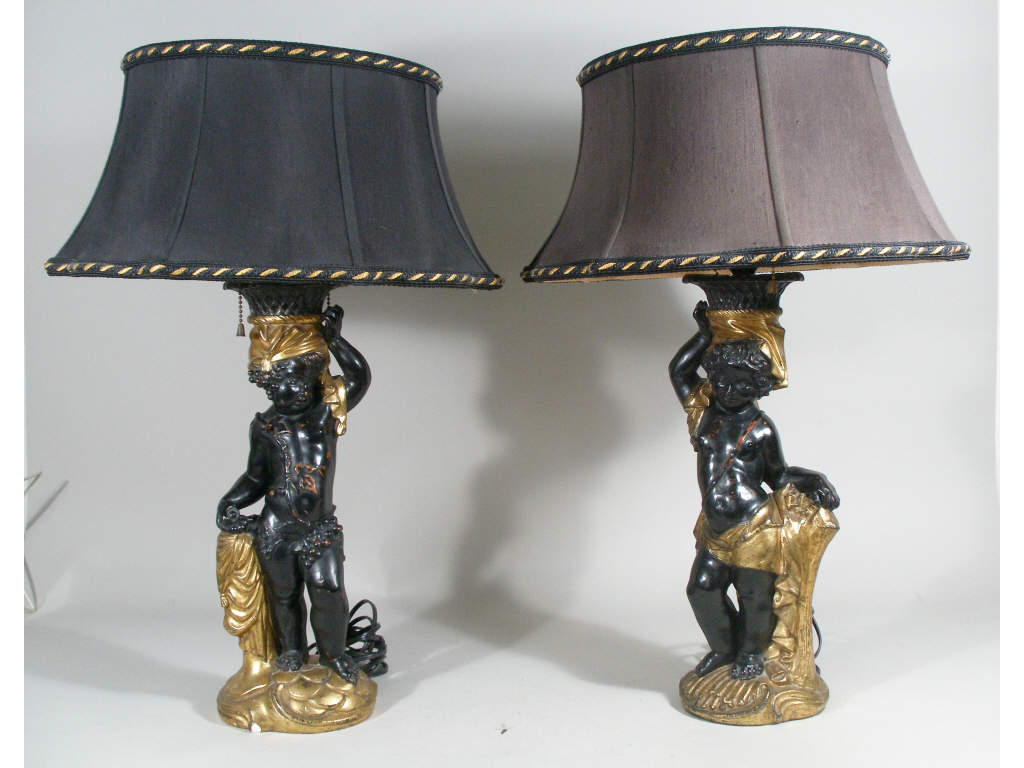 Appraisal: Pair of Blackamoor Table Lamps Mid th c young male