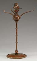 Appraisal: TIFFANY STUDIOS LAMP BASE With three-arm spider for a shade