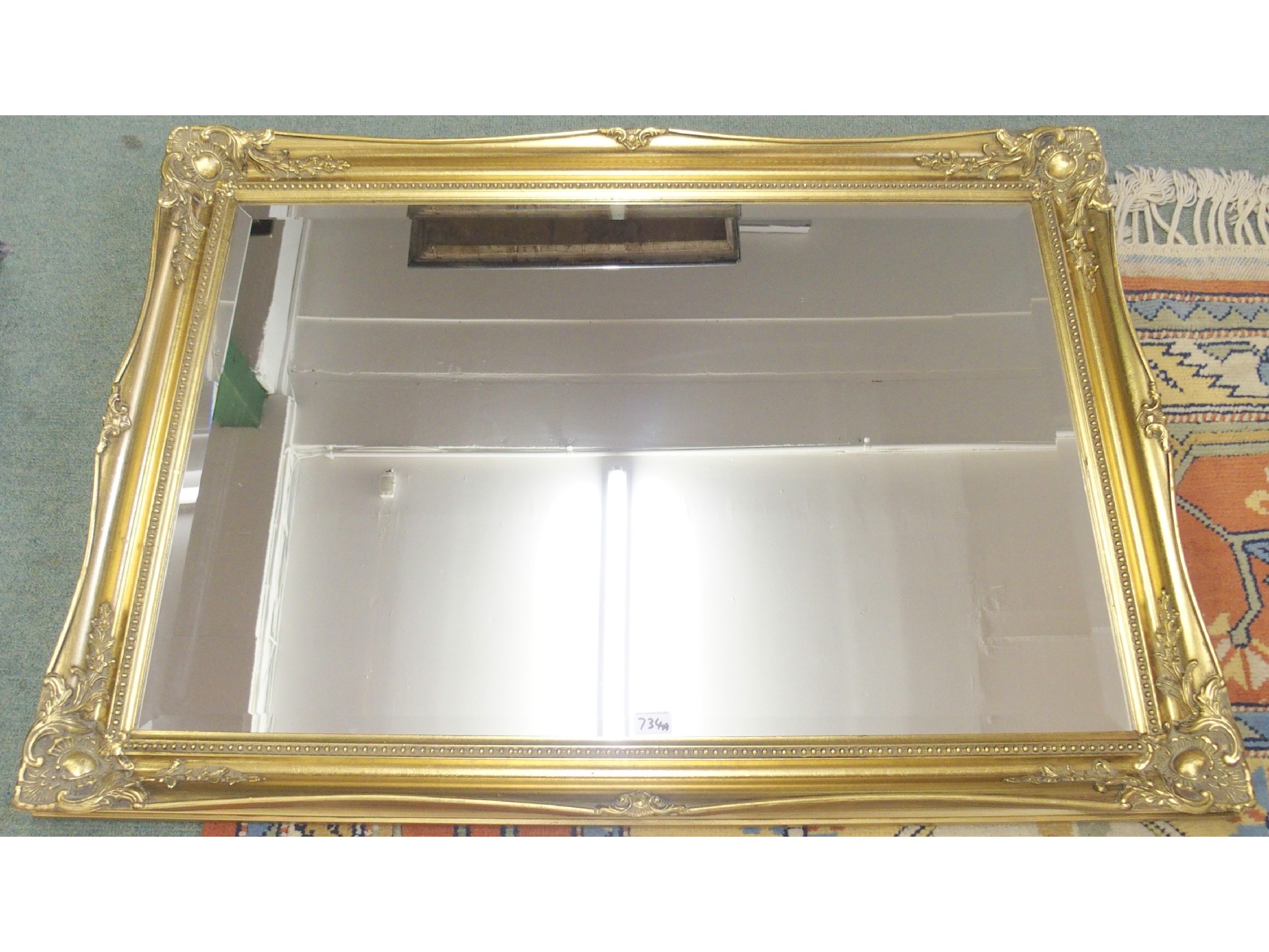 Appraisal: A gilt framed mirror x cm