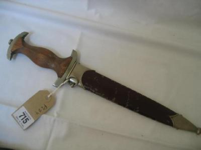 Appraisal: AN S A NAZI DAGGER with wood grip inset with