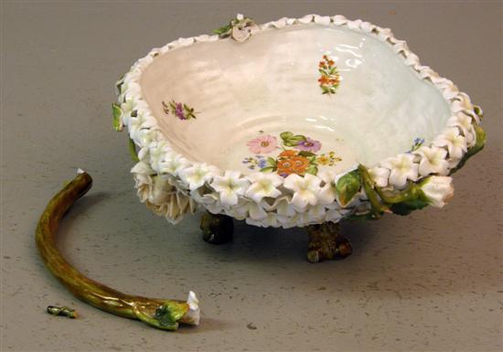 Appraisal: Twentieth century Dresden floral encrusted basket raised on four feet