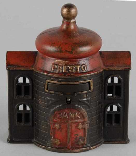 Appraisal: Cast Iron Presto Mechanical Bank Description Working Includes key Condition