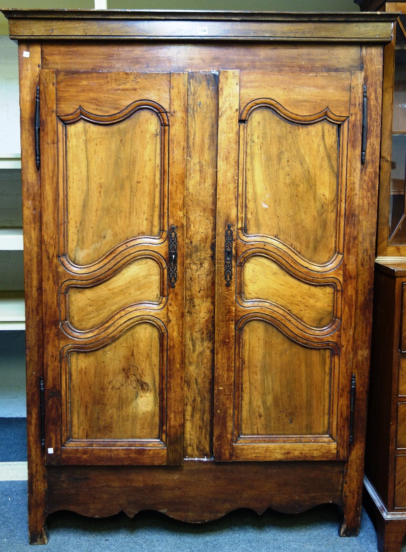 Appraisal: An th century French walnut two door armoire cm wide