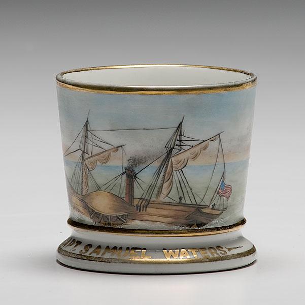 Appraisal: SIDE WHEEL SAIL STEAMER OCCUPATIONAL SHAVING MUG porcelain with polychrome