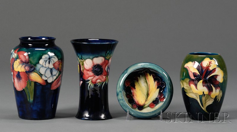 Appraisal: Four Moorcroft Pottery Items England th century a Columbine design