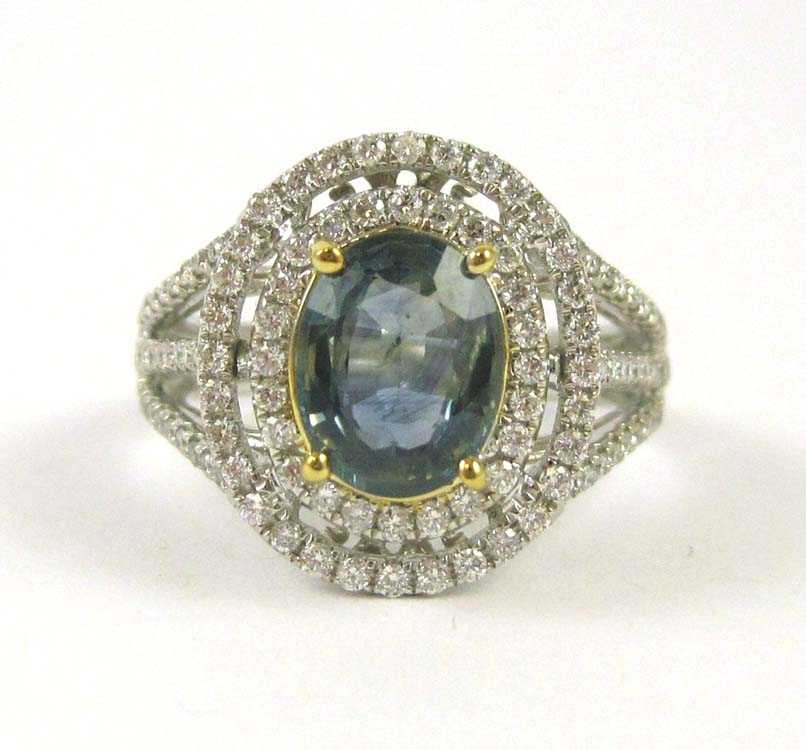 Appraisal: SAPPHIRE DIAMOND AND FOURTEEN KARAT GOLD RING having approximately cts