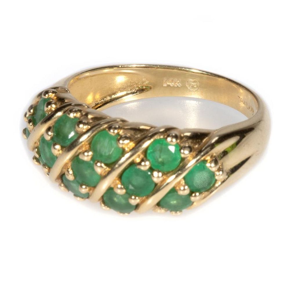 Appraisal: Emerald and k gold dome ring set with round-cut emeralds