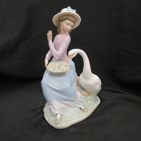 Appraisal: Lladro Porcelain Figurine of Seated Ladytrying to keep a goose