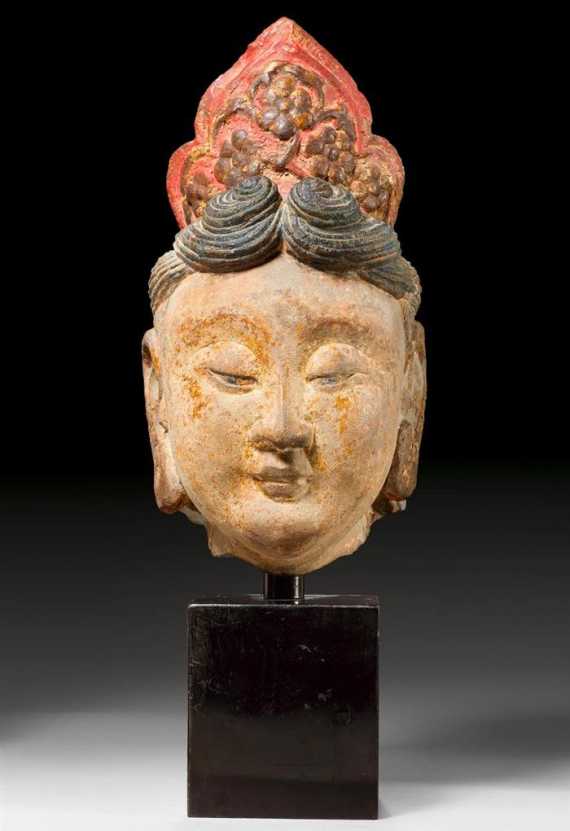 Appraisal: A FINE STONE HEAD OF A BODHISATTVA China Liao dynasty