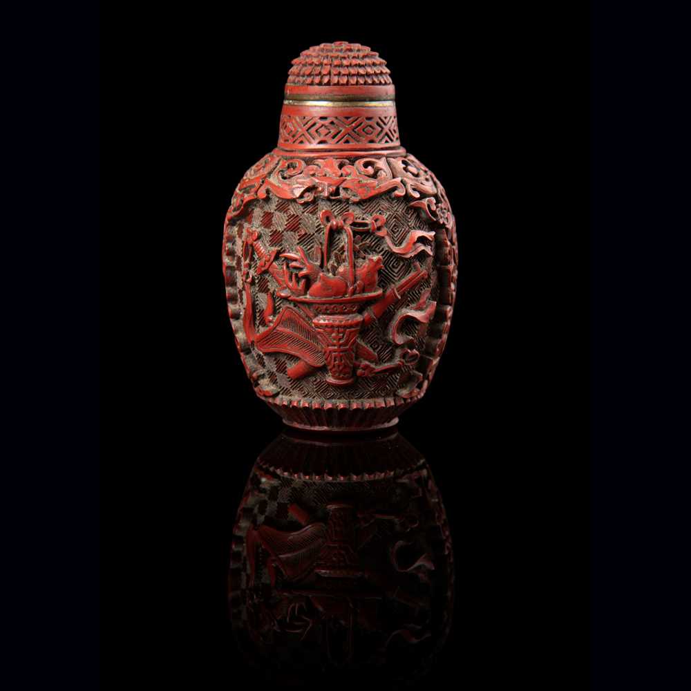 Appraisal: CARVED CINNABAR LACQUER 'EIGHT DAOIST EMBLEMS' SNUFF BOTTLE QING DYNASTY