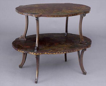 Appraisal: CHINOISERIE MAROON-GROUND LACQUER TWO-TIER TABLE The graduated oblong quatrefoil tiers