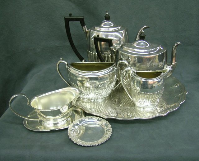 Appraisal: Group of Assorted Silver Plate Serving Items Including Four Piece