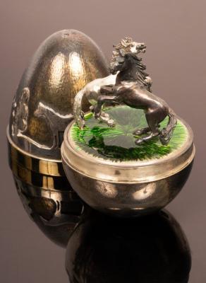 Appraisal: Stuart Devlin - a silver and silver gilt surprise egg