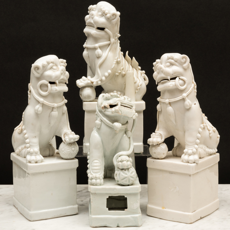 Appraisal: Four Blanc de Chine Porcelain Buddhistic Lion Joss Stick Holders