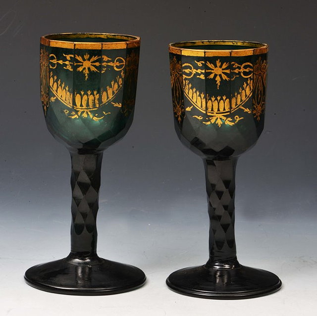 Appraisal: A PAIR OF BRISTOL GREEN MULTI-SIDED GLASSES each with facet