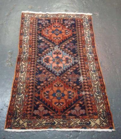 Appraisal: Hand Made Antique Throw Rug Has wear From a Central