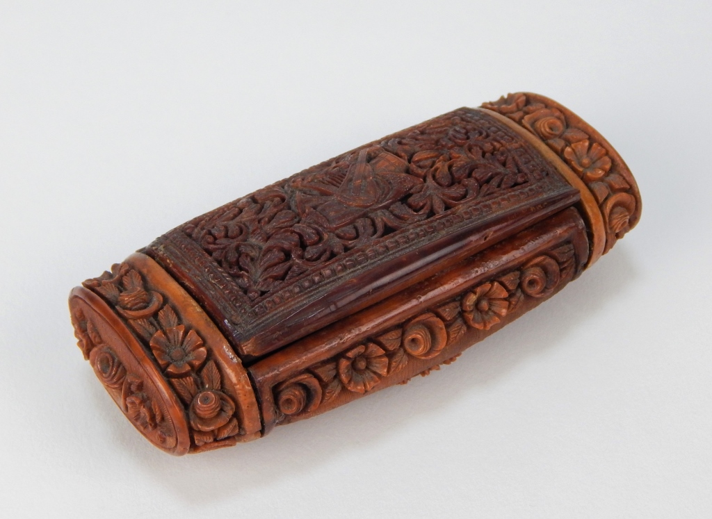 Appraisal: C ANGLO-INDIAN COQUILLA NUT SNUFF BOX India th CenturyRelief carved