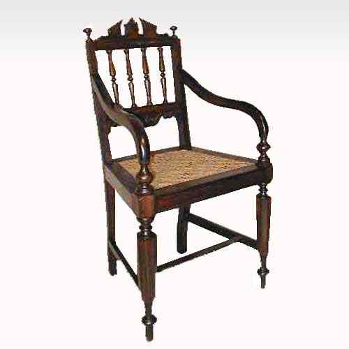 Appraisal: An Anglo Indian Caned Rosewood Child's Armchair circa having a