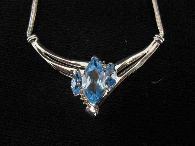 Appraisal: Blue Topaz Diamond Necklace trio of marquise gems and small