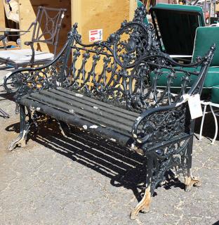 Appraisal: Rococo style painted wrought iron bench with a pierced scrolling